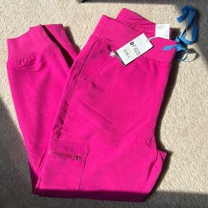 Medium, petite figs scrubs in the color raspberry sorbet